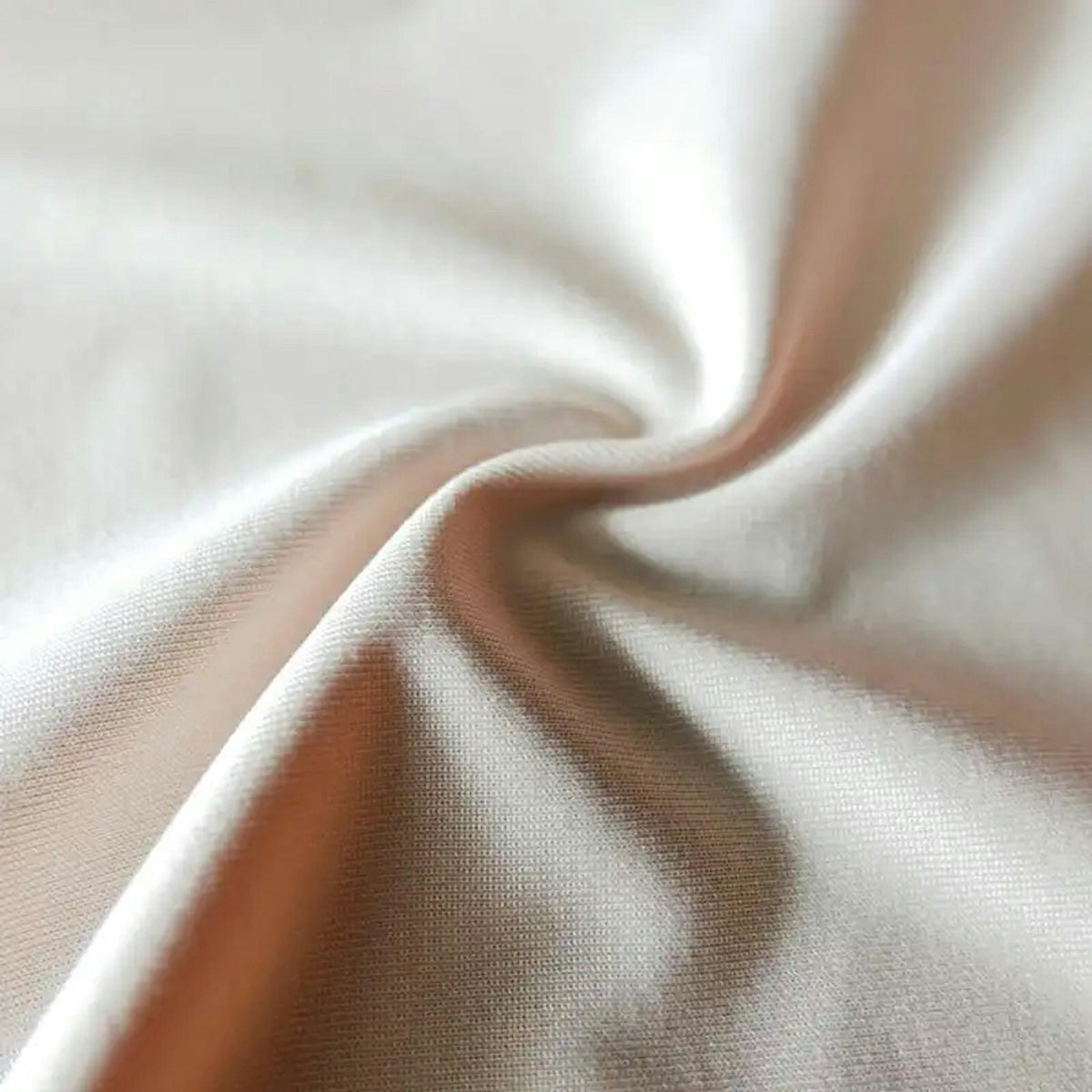a close up view of a white fabric