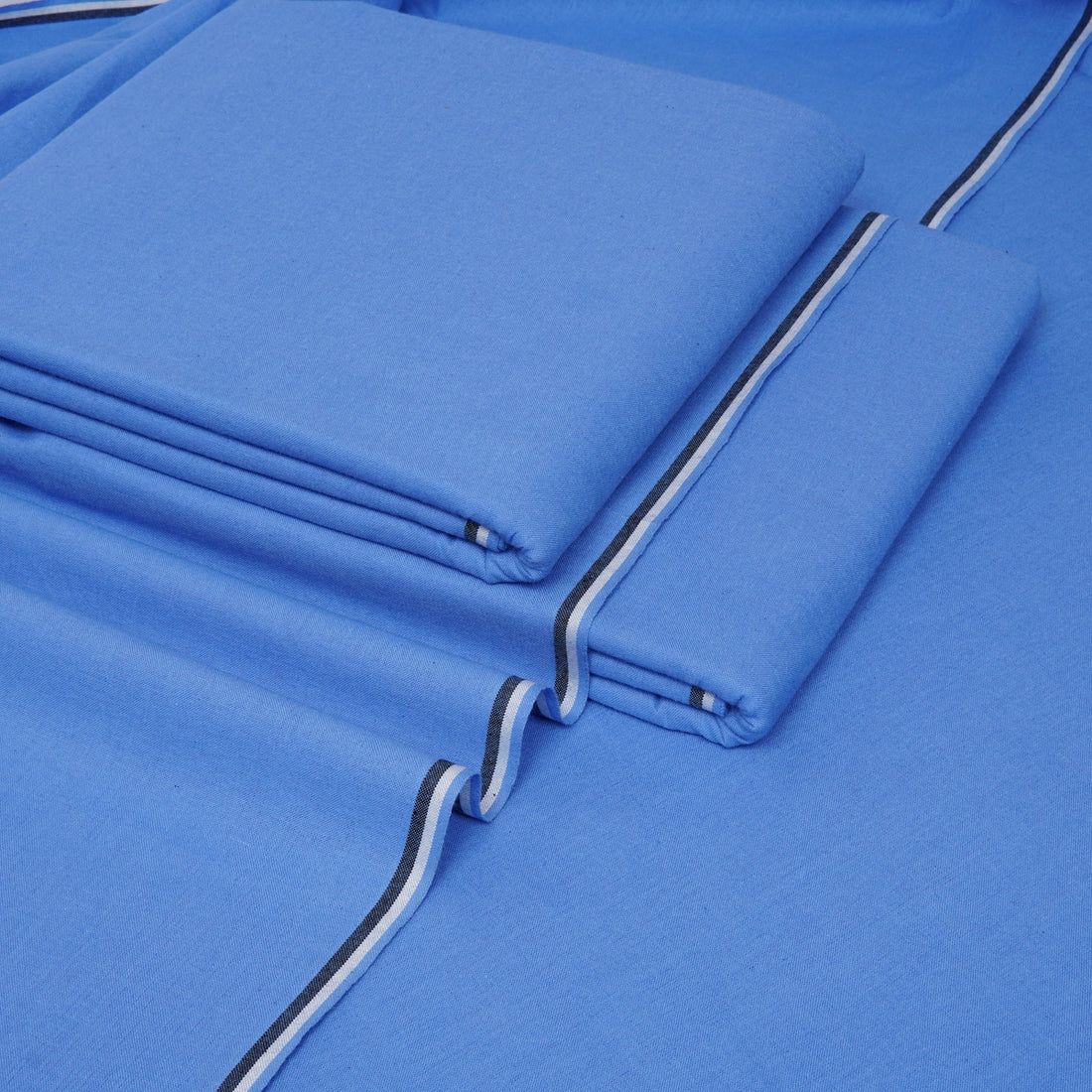a close up of a blue sheet set
