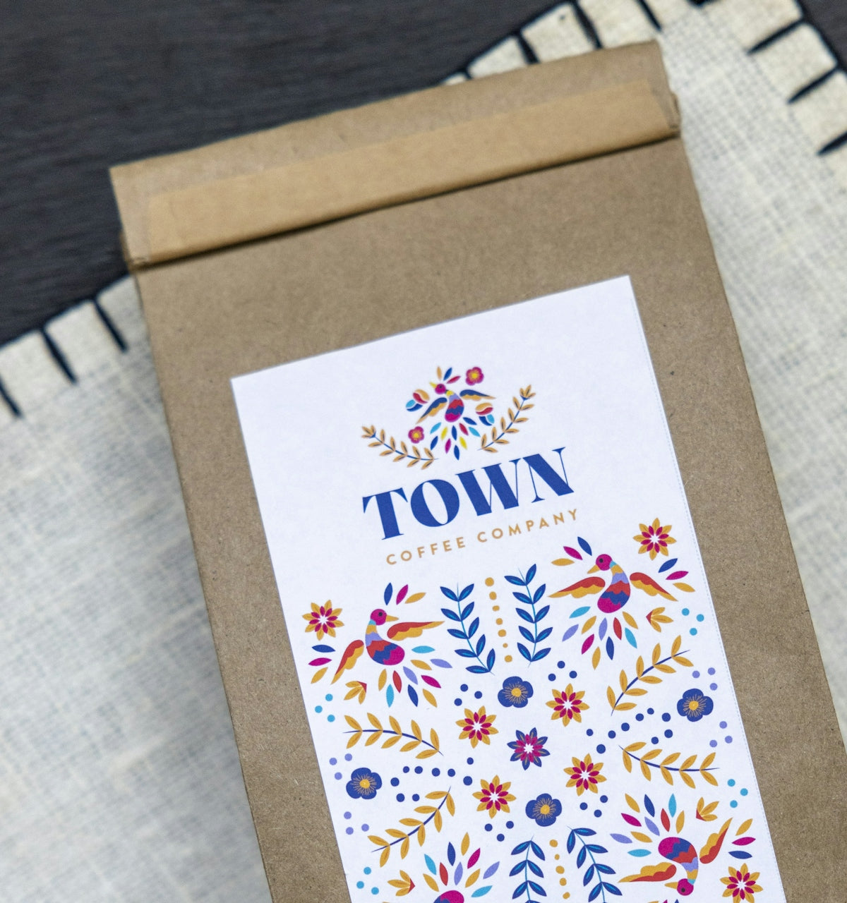 a brown paper bag with a design on it