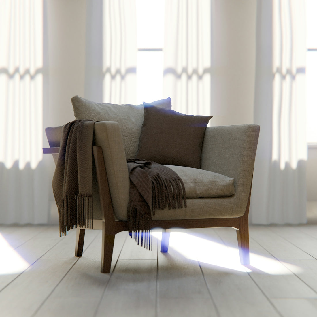 A comfortable armchair with blankets and pillows.
