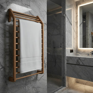 White bath towel with a textured border on a black background