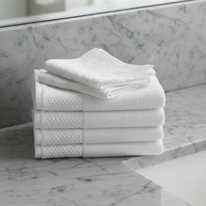 White washcloths textured towel on a black background