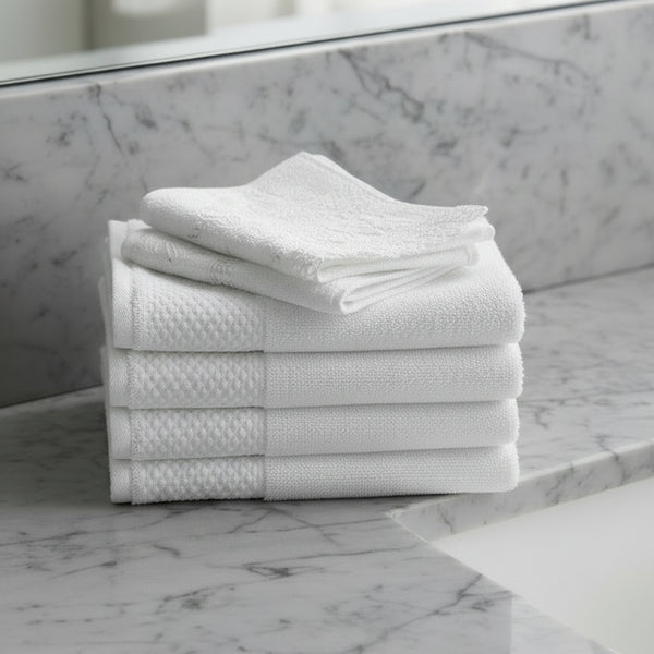 White washcloths textured towel on a black background